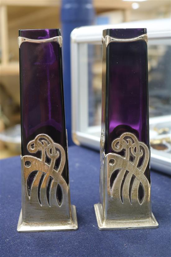 A pair of Austro Hungarian Art Nouveau 800 standard white metal mounted amethyst glass vases.